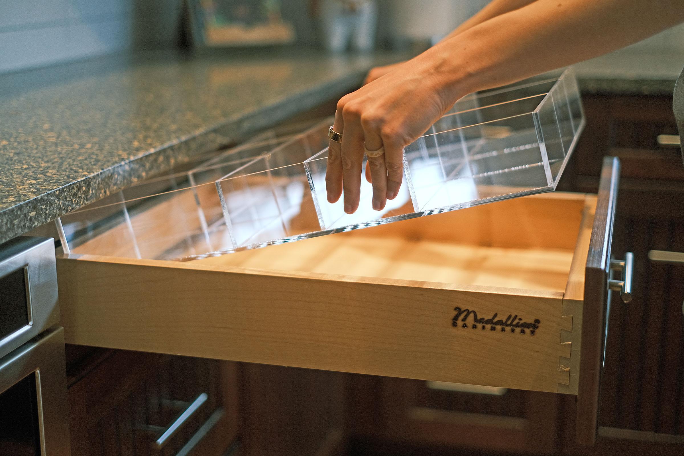 Installed acrylic drawer organizer